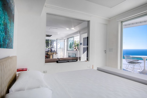 Open Space in stile contemporaneo di 50 di Jerry Caputo & Partners