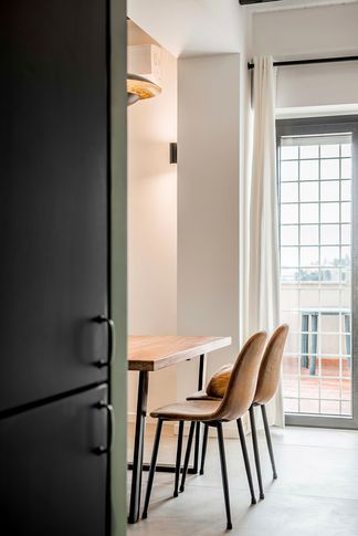 Open Space in stile industriale di 40 di Equus Architects