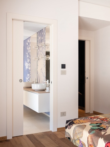 Camera da Letto in stile moderno di 18 di Studio di Architettura Barbara Vucusa Architetto Camera da Letto in stile moderno di 18 di Studio di Architettura Barbara Vucusa Architetto