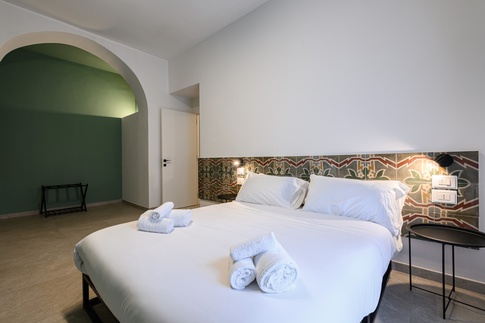 Camera da Letto in stile contemporaneo di 18 di MANUARINO architettura design comunicazione