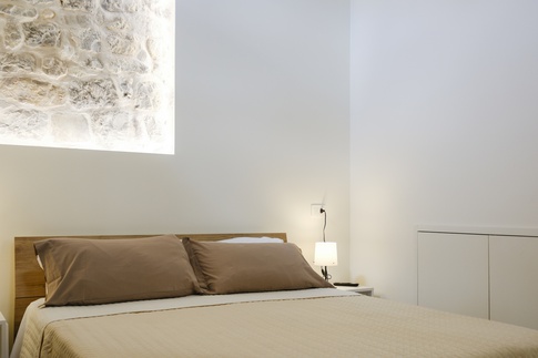 Camera da Letto in stile rustico di 14 di ValentinaZoccoArchitetto