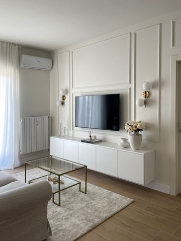 Open Space in stile contemporaneo di 25 di Silvia Aquilani . Design studio