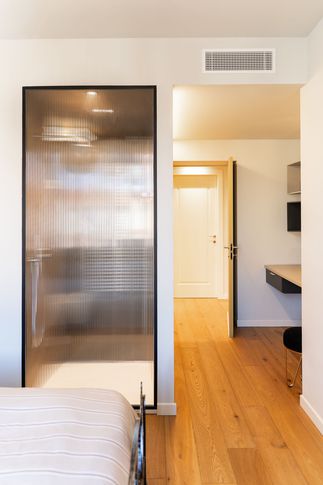 Camera da Letto in stile eclettico di 14 di Davide Gratteri Architetto