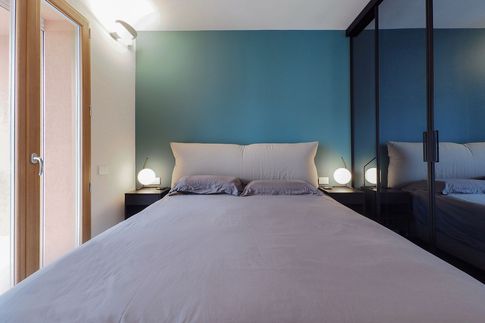 Camera da Letto in stile moderno di 12 di Desearq studio - architettura e interior design