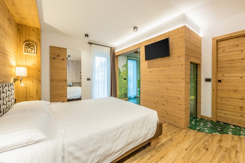 Camera da Letto in stile naturale di 24 di Arredamenti Andalo