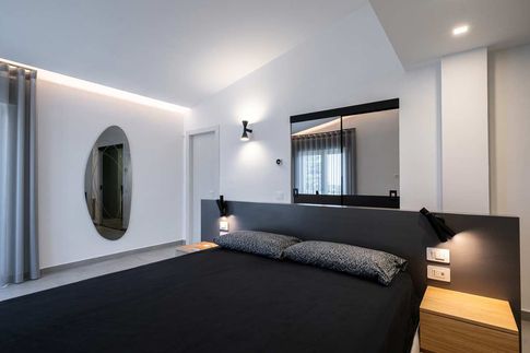Camera da Letto in stile contemporaneo di 30 di MANUARINO architettura design comunicazione