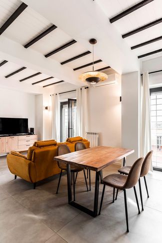 Open Space in stile industriale di 40 di Equus Architects