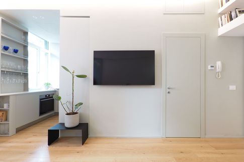 Soggiorno in stile scandinavo di 18 di Desearq studio - architettura e interior design