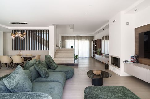 Open Space in stile contemporaneo di 115 di Ciquadro Architetti
