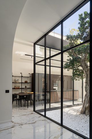 Open Space in stile contemporaneo di 450 di Studiounoarchitettura