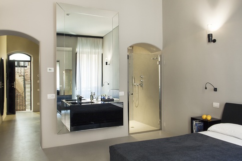 Camera da Letto in stile eclettico di 60 di COLLETTIVO_INVƎRSO