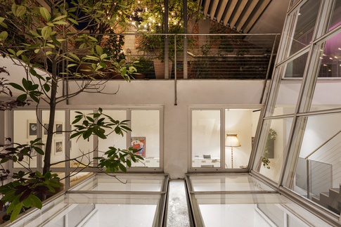 Terrazza in stile eclettico di 50 di NOMADE ARCHITETTURA