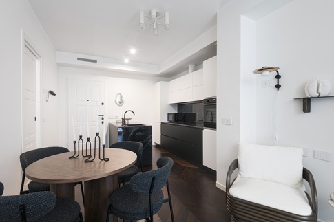 Open Space in stile contemporaneo di 20 di Martini & Partners