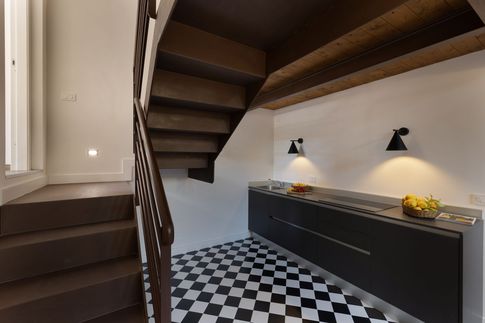 Soggiorno in stile retrò di 30 di Coluccio architetti