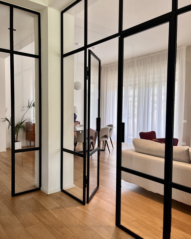 Open Space in stile contemporaneo di 70 di Linea Architettura Design Interior Open Space in stile contemporaneo di 70 di Linea Architettura Design Interior