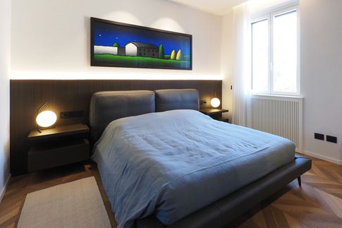 Camera da Letto in stile moderno di 12 di Desearq studio - architettura e interior design