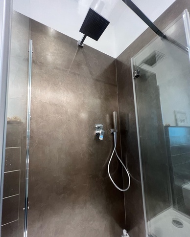 Bagno in stile contemporaneo di 10 di Architetto Trubini Maria Chiara Bagno in stile contemporaneo di 10 di Architetto Trubini Maria Chiara