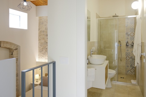 Camera da Letto in stile rustico di 14 di ValentinaZoccoArchitetto