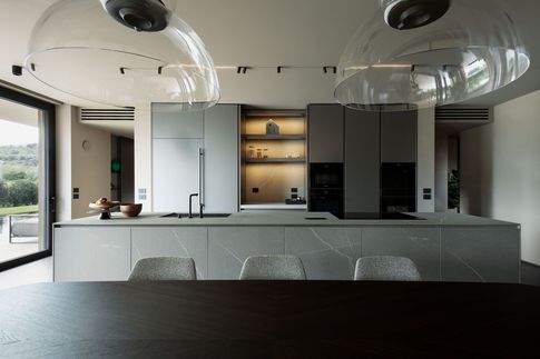 Cucina in stile minimal di 25 di Didonè Comacchio Architects