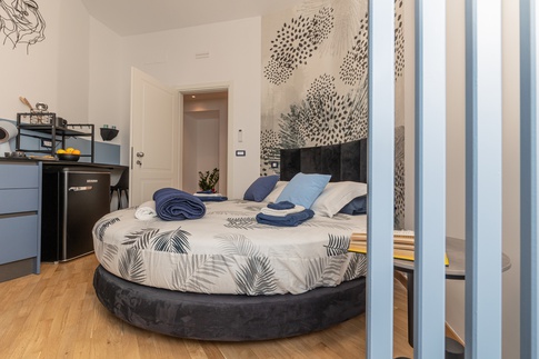 Camera da Letto in stile urban di 13 di Valentina Solera Architetto Camera da Letto in stile urban di 13 di Valentina Solera Architetto