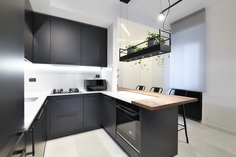 Open Space in stile soft industrial di 45 di Desearq studio - architettura e interior design