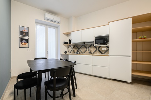 Cucina in stile contemporaneo di 10 di MANUARINO architettura design comunicazione