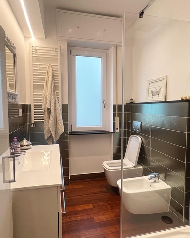 Bagno in stile contemporaneo di 10 di Architetto Trubini Maria Chiara