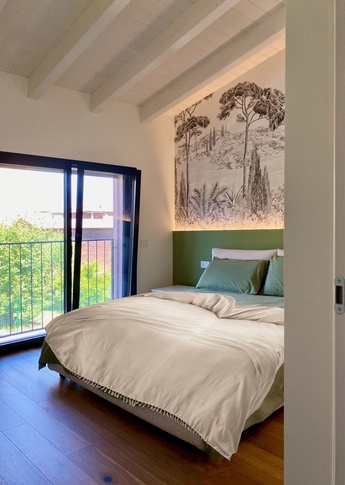 Camera da Letto in stile moderno di 17 di SuMisura Architetti