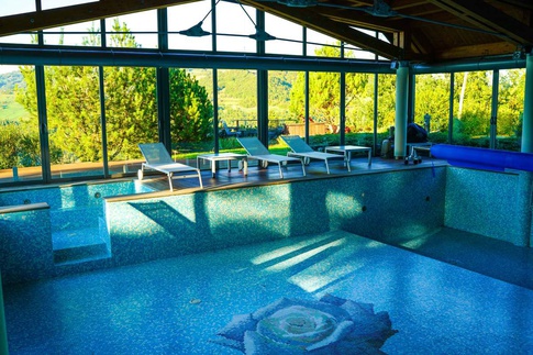 Piscina in stile moderno di 75 di Studio Pinelli