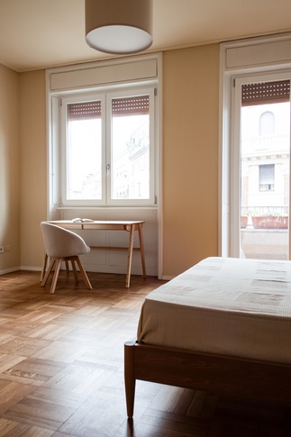 Camera da Letto in stile contemporaneo di 23 di SuMisura Architetti