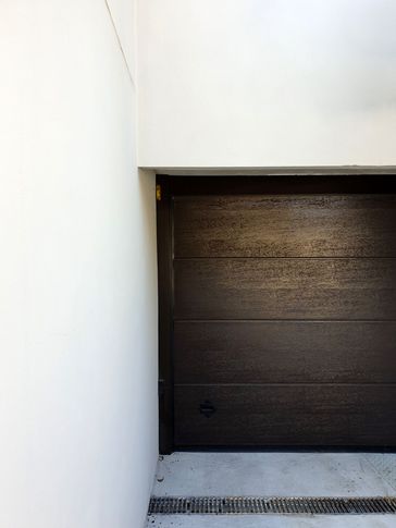 Garage in stile contemporaneo di 30 di architempore