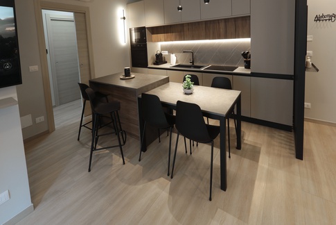 Open Space in stile moderno di 65 di Chiara Colucci Interior Designer