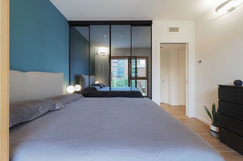 Camera da Letto in stile moderno di 12 di Desearq studio - architettura e interior design