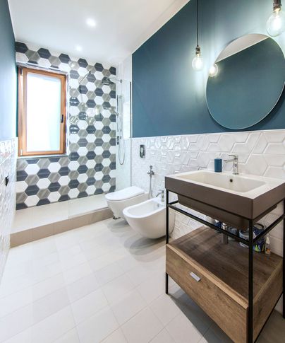 Bagno in stile industriale di 15 di Pucciarelli Architetti