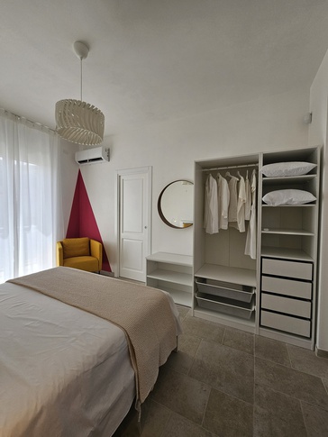 Camera da Letto in stile mediterraneo di 14 di Alessandra Gambino Architetto - AGA