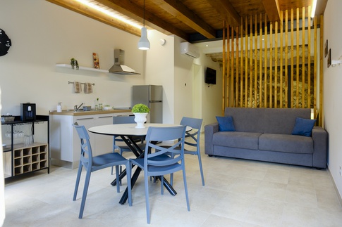 Open Space in stile rustico di 28 di ValentinaZoccoArchitetto