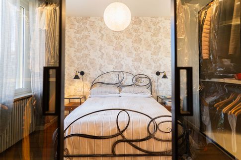 Camera da Letto in stile eclettico di 14 di Davide Gratteri Architetto