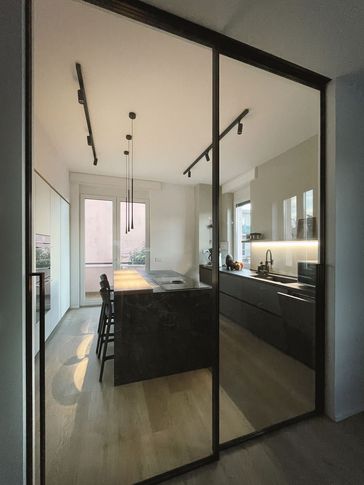 Cucina in stile moderno di 15 di Silvia Aquilani . Design studio