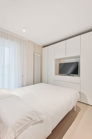 Camera da Letto in stile minimal di 11 di Sofia Carta Studio