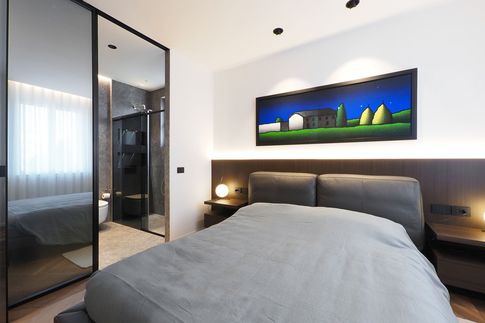 Camera da Letto in stile moderno di 12 di Desearq studio - architettura e interior design