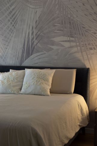 Camera da Letto in stile moderno di 19 di Silvia Aquilani . Design studio