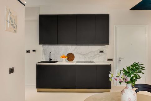 Open Space in stile minimal di 28 di Sofia Carta Studio Open Space in stile minimal di 28 di Sofia Carta Studio