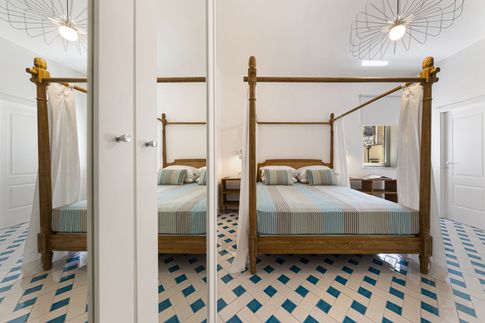 Camera da Letto in stile mediterraneo di 27 di Coluccio architetti