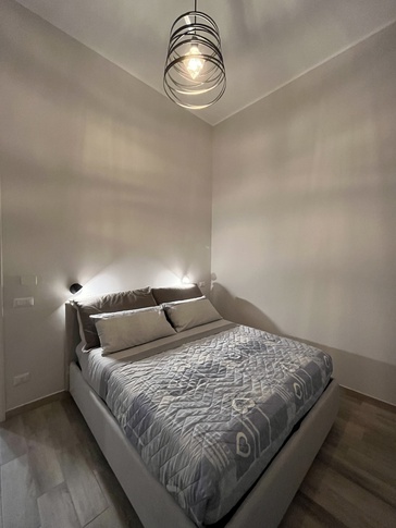 Camera da Letto in stile contemporaneo di 5 di Architetto Eros Di Prima Camera da Letto in stile contemporaneo di 5 di Architetto Eros Di Prima