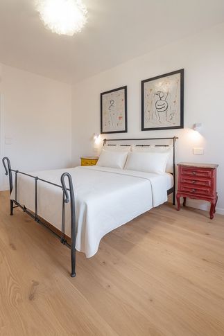 Camera da Letto in stile eclettico di 16 di Studio di Architettura Barbara Vucusa Architetto