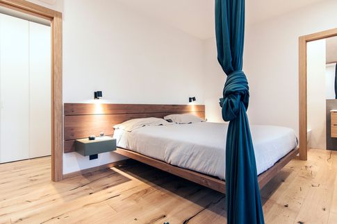 Camera da Letto in stile industriale di 25 di Pucciarelli Architetti