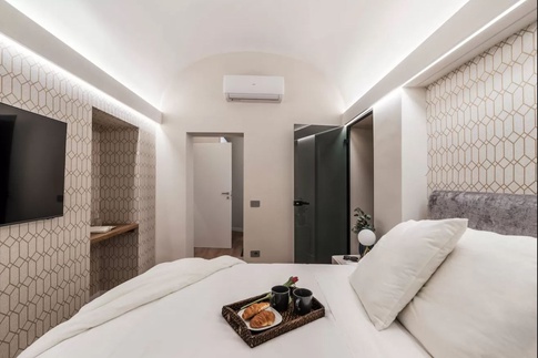 Camera da Letto in stile moderno di 16 di Stefano Proietti Architetto