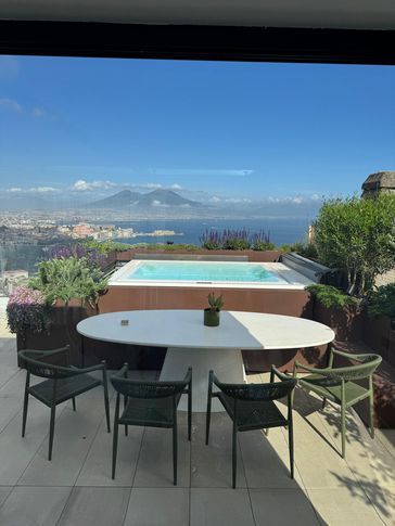 Veranda in stile contemporaneo di 35 di Paola Sola Architetto
