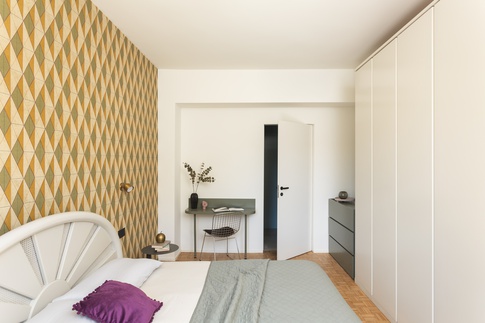 Camera da Letto in stile eclettico di 16 di Hop!Arch