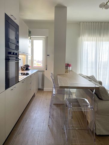 Open Space in stile contemporaneo di 25 di Silvia Aquilani . Design studio